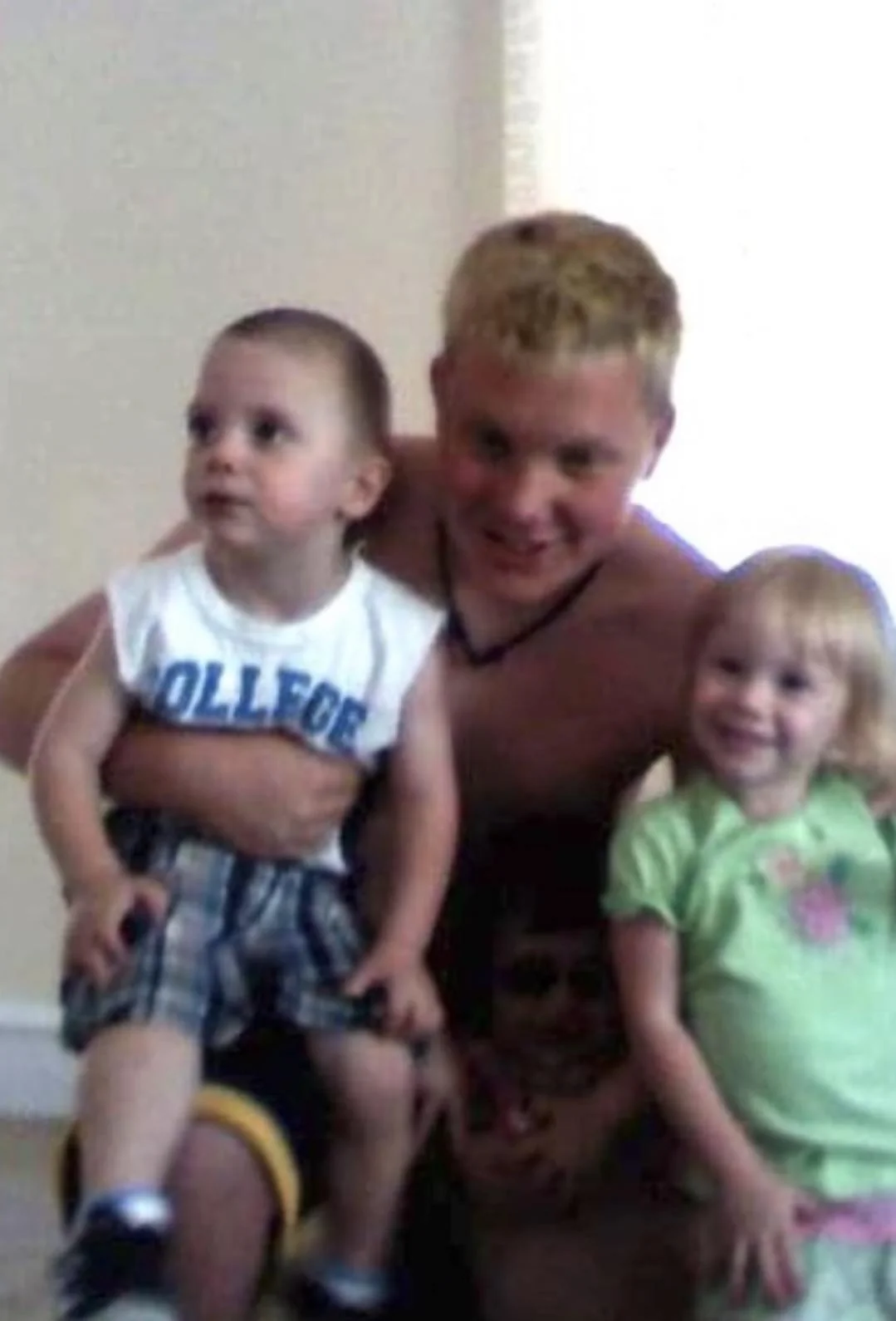 Picture is of teenage me holding 2 of my cousins.