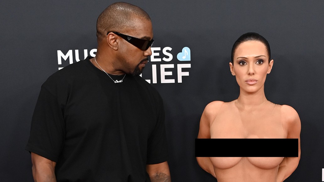 Lip reader decodes what Kanye said to almost-nude wife at Grammys